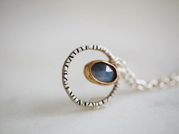 gold and silver moonstone pendant